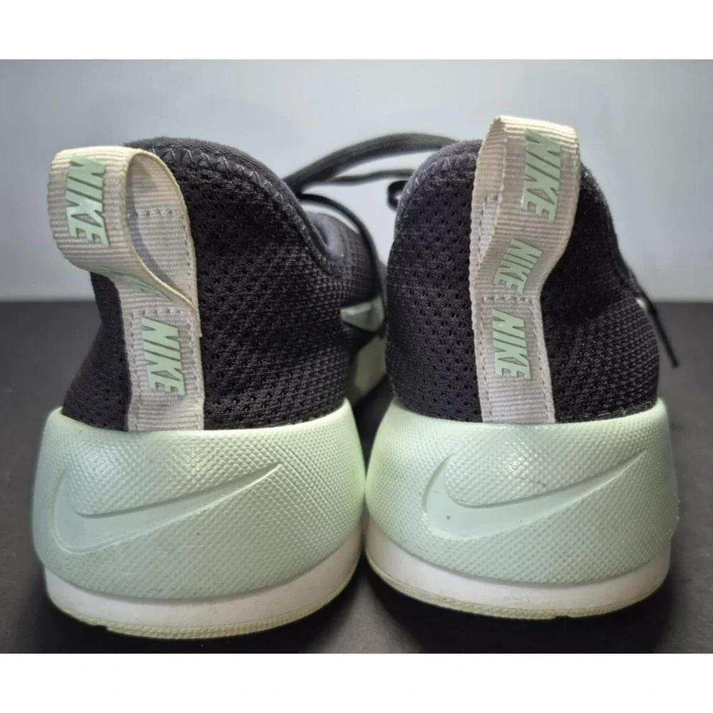Nike women's tennis shoe navy with seafoam green‎ swoosh logo sz 7.5 lightweight